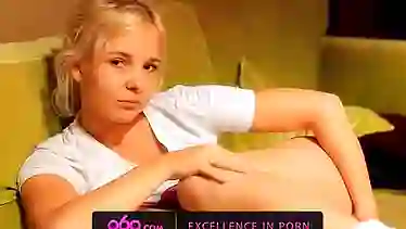 Tiny blonde Monroe solo masturbates on couch