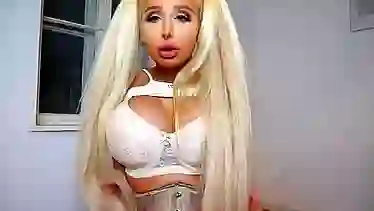 Real life Barbie is ready for a wild fuck from the back and an intense orgasm