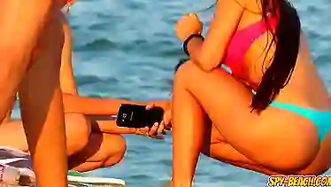 Watch this hot amateur teen get naughty in public with her blue bikini on!