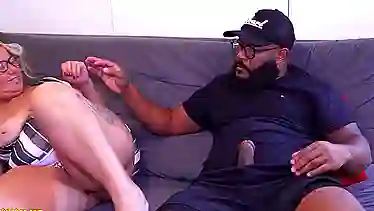Blonde mature babe with huge tits enjoys making a lot of fun with a young black guy
