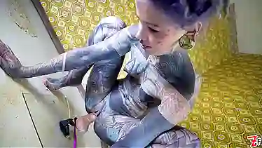 Watch this alternative tattooed babe play with a huge toy for some hot solo action