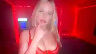Sexy blonde stripper MILF flaunts her curves in hot lingerie