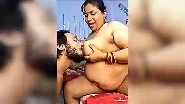 Watch this Desi BBW Bhabhi strip down and flaunt her curves on webcam